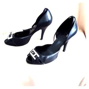 BCBGeneration black leather heels with buckle.